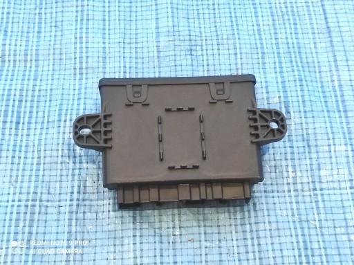 JX7T14B673 - МОДУЛЬ БЛОКУВАННЯ БАГАЖНИКА FORD FOCUS MK4