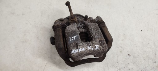 caliper rear part rear left Opel Astra K LIFT 1,5 CDTI