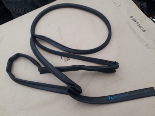 УЩІЛЬНЮВАЧ ДВЕРЕЙ ЛІВИЙ ЗАДНІЙ NISSAN LEAF II