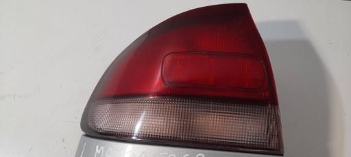 Mazda 626 sedan light rear left 0431392L (r483)