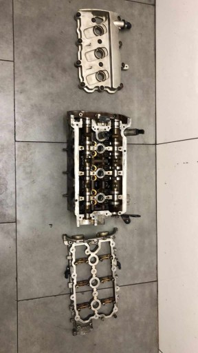 КРЫШКА РОЛИКА ГОЛОВКИ ПРАВА A6 C6 3.2 06E103374B