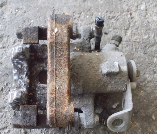 SKODA ROOMSTER 1.6 TDI caliper brake right rear part