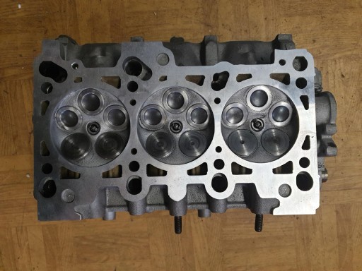 REGENEROWANA head. left AUDI PASSAT 078103373AH