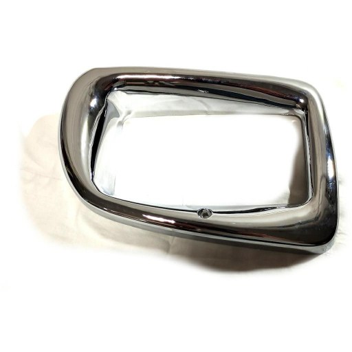 Корпус фари рамка V34594600 правий 34594610