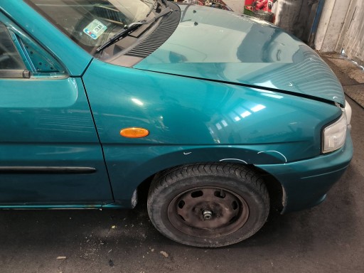 fender right front green MAZDA DEMIO and