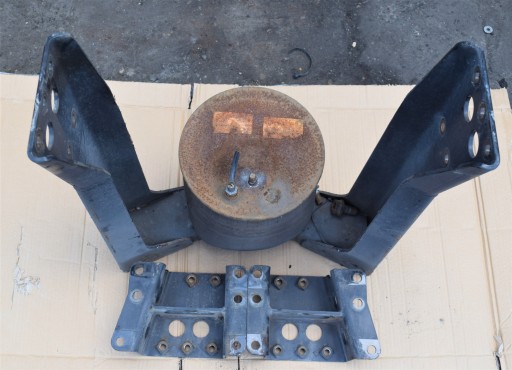 Підйомний механізм для ведучої осі людини-блізнюка