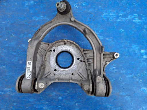 holder of a shock absorber left front TESLA MODEL Y 2020R-> 1044032-00-C