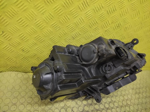VW TOURAN and REFLEKTOR light left front 1T1941005B
