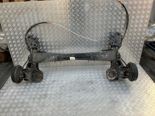 DG10404 - Балка моста задняя подвеска барабаны opel corsa f 19- 1.2 vti