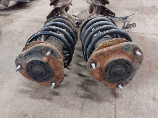 shock absorber spring swing left right front TOYOTA COROLLA E12