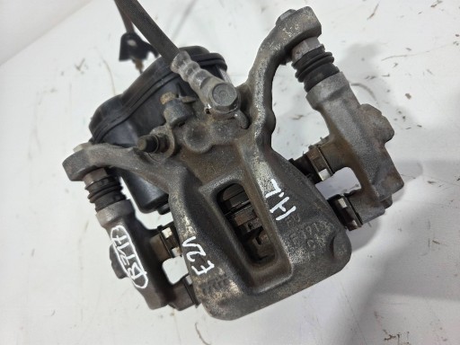 Toyota Corolla E210 E21 caliper brake rear left F391C (B717)