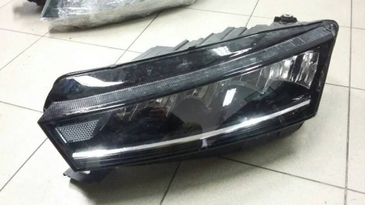 REFLEKTOR left SKODA OCTAVIA IV 19- 5E4941015 OK!