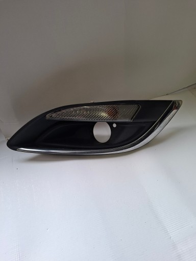grid of a bumper left indicator OPEL ASTRA IV 13368708