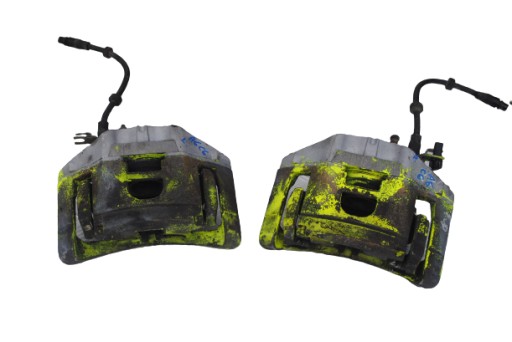 973 974 - Гальмівні супорти передні 320мм AUDI A6 C6 3.0 TDI