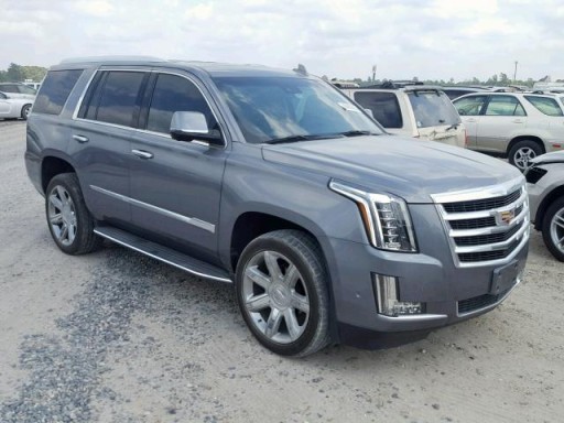 CADILLAC ESCALADE 15 + ЧВЕРТЬ ЗАДНЄ КРИЛО