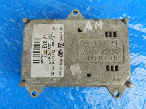 5DF00870421 - OPEL-запчасти Astra H модуль поворота BI-XENON 13210773
