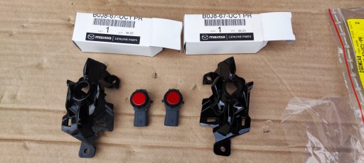 DGJ3-50154 DGJ3-50164 - Mazda cx30 pdc кріплення в решітку справа ліва нова + парктроник