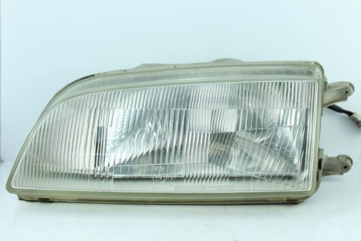 REFLEKTOR light front SUZUKI SWIFT left 11032272 KOITO