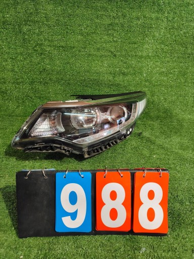 REFLEKTOR left front KIA OPTIMA IV 15- lens NR.988