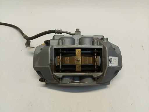 Tesla Model 3 III caliper left front front oryg 104461-00-e