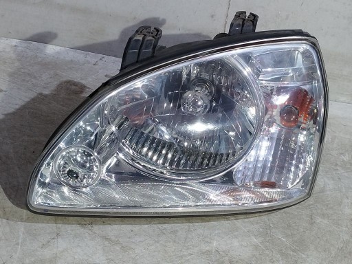 Kia Carens II 2 light left front front
