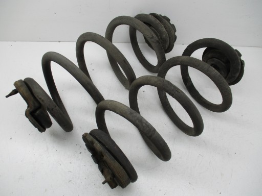 Qashqai +2 07-13 j10 пружина задня пружина задня