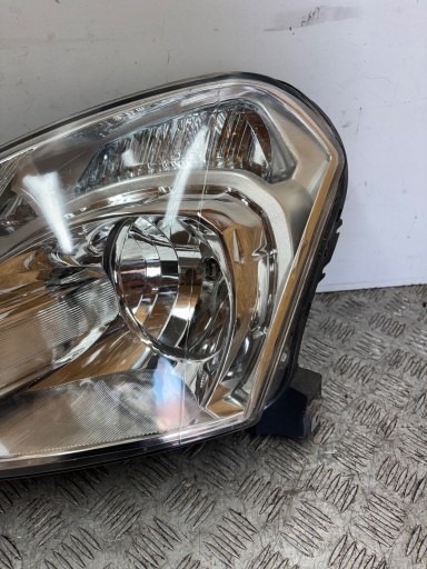 REFLEKTOR light left NISSAN QASHQAI J10 06-09