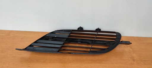 NISSAN ALMERA TINO right grid of a bumper ATRAPKA