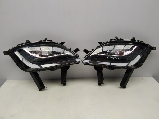 09r- Opel Astra IV J indicator left right ciemny of a bumper front fog light