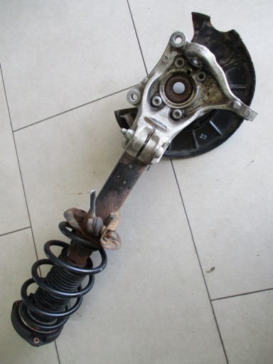 Passat b7 1.6 tdi 10-15 амортизатор поворотного кулака левый