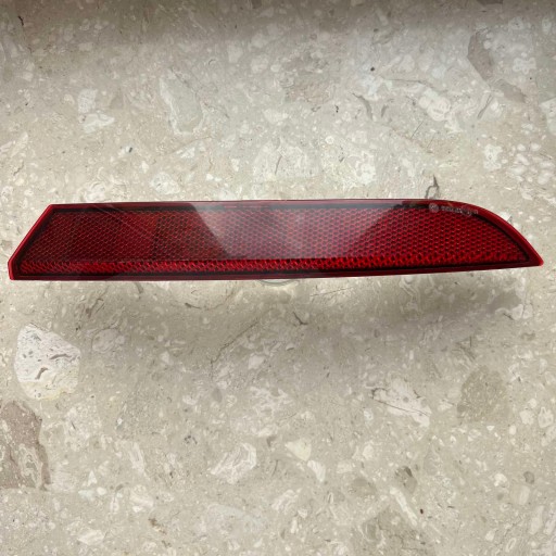 SKODA OCTAVIA IV KOMBI LIFT 24 - ODBLASK of a bumper left rear part 5E7945105
