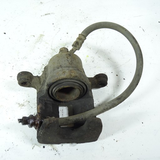 SUZUKI GRAND VITARA 1.9D caliper brake rear part left