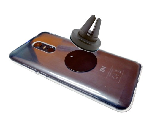 Magnetický držák holder do auta mřížky telefon za 76 Kč od Zielonki -  Allegro - (12495386067)