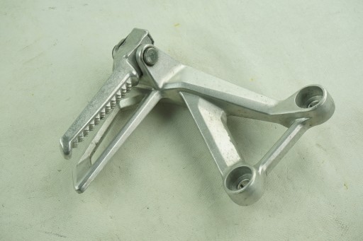 MJW-L1 - ПОДНОЖКА ПАССАЖИРСКАЯ ЛЕВАЯ HONDA CBR 500R 19+