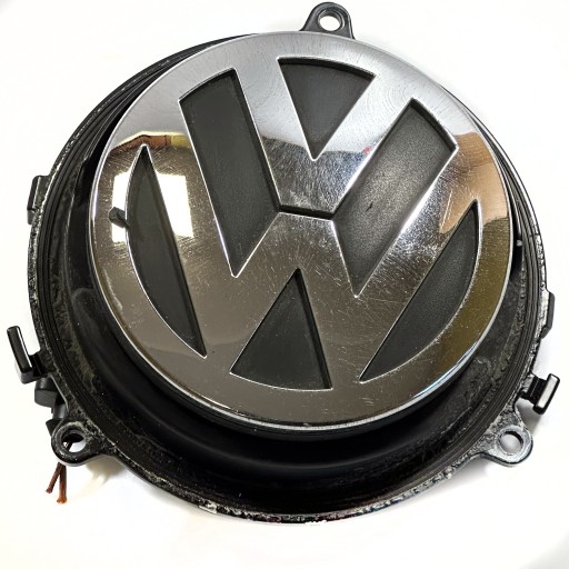 ЭМБЛЕМА РУЧКИ ЗАДНЕЙ ДВЕРИ VW PASSAT B6 1K0827469D