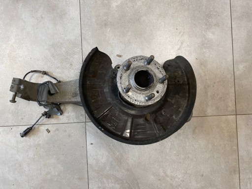 6007017-00-C - Tesla model s 13 передний левый поворотный кулак