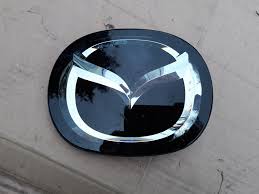 53479854 - MAZDA CX3 2017 22 ЗНАЧОК СТЕКЛЯННЫЙ ЛОГОТИП ПОД РАДАРОМ