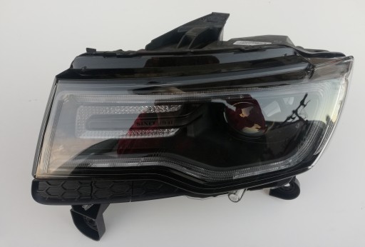 K68142493af - КСЕНОНОВАЯ ЛАМПА JEEP GRAND CHEROKEE ЛЕВАЯ 68111035AE