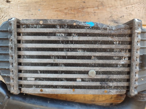 radiator of the intercooler OPEL ZAFIRA A (F75_) OE 24436438DF1