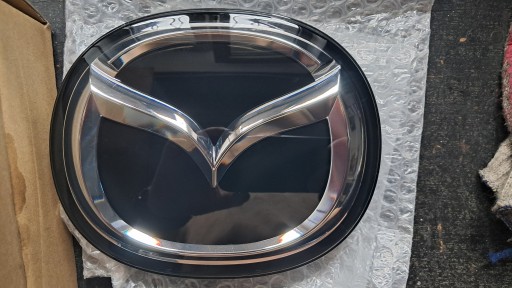 GSH7-51-730 - РАДАР ЭМБЛЕМА ЛОГОТИП MAZDA 6 GL 2018-2022 НОВОЕ OE