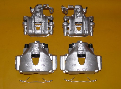 98-06 264/10 - ЗАТИСКАЧІ ЛІВИЙ ПРАВИЙ ПЕРЕДНІЙ ЗАДНІЙ OPEL ASTRA II 2 G