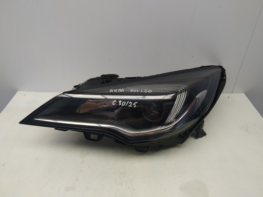 Opel Astra V K reflektor light front left zwykly lens + LED OM 13401141