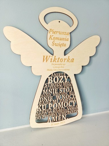 Дерев'яний ангел з молитвою