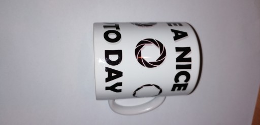 Zdjęcie oferty: Kubek porcelana " Have a nice photo day"