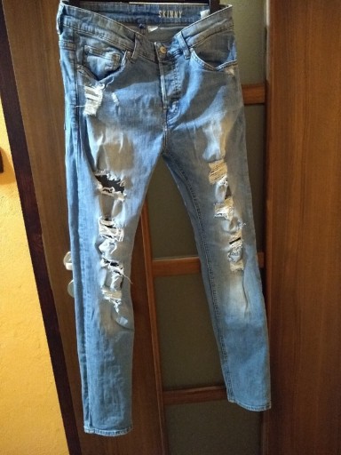 Zdjęcie oferty: Spodnie jeansowe z dziurami H&M 30/32 105cm unisex