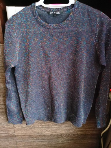 Zdjęcie oferty: Sweter bluzka z błyszcząca nitka jak nowy