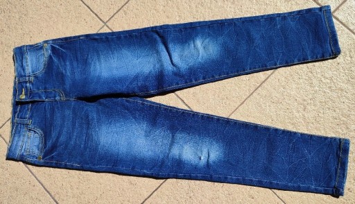 Zdjęcie oferty: Spodnie jeansowe 134