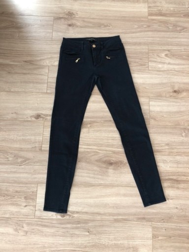 Zdjęcie oferty: Granatowe rurki River Island z zamkami Uk 6 xs/s