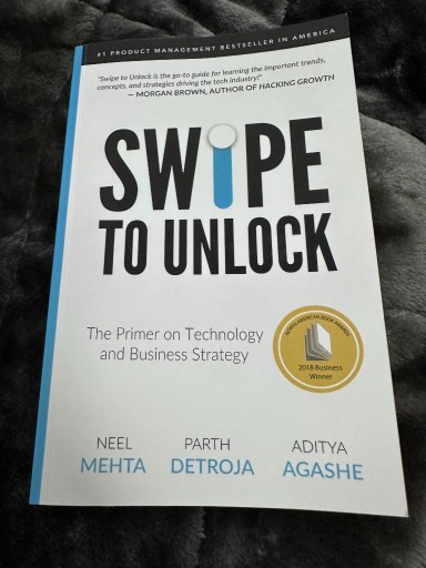 Zdjęcie oferty: Swipe to Unlock: The Primer on Technology...