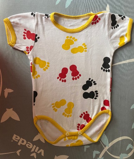 Zdjęcie oferty: body ze stópkami, r.74